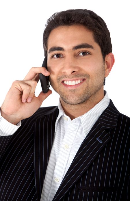Business man talking on the phone - isolated over a white background