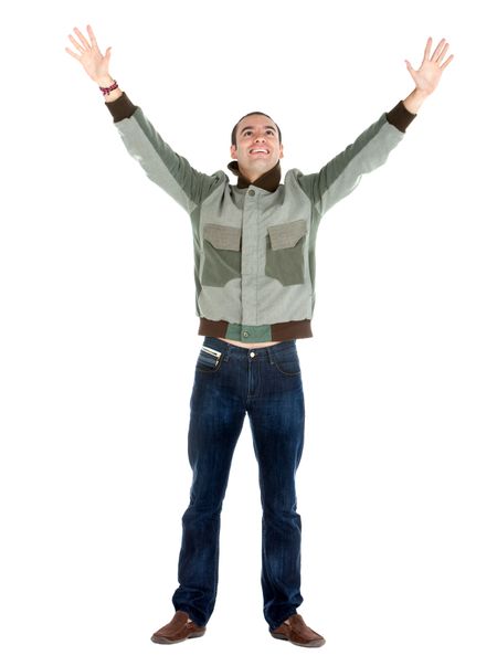 Happy handsome man with arms up - isolated over a white background