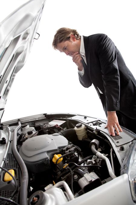 Man having car trouble with an opened hood - isolated over a white