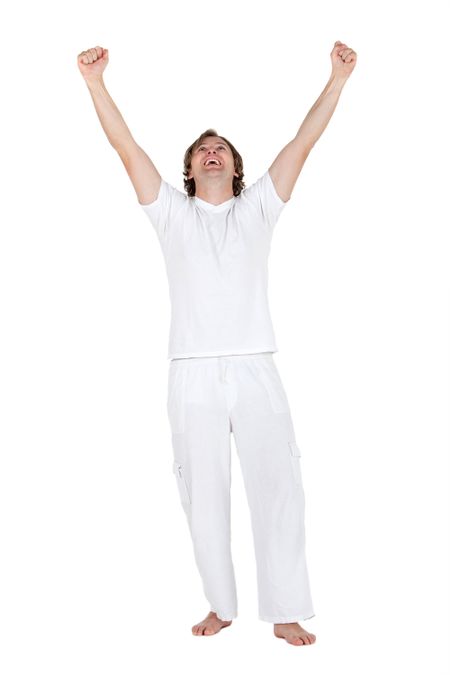 Excited fullbody man in white with arms up - isolated