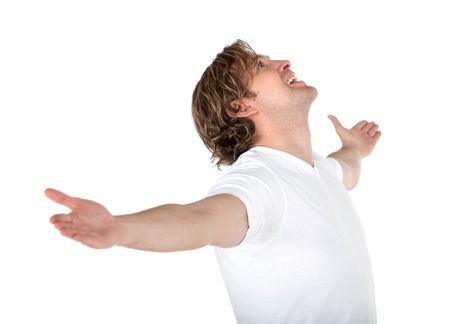 Excited man in white with arms opened - isolated