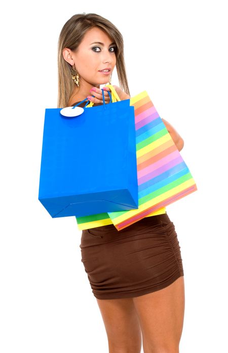 fashion-woman-portrait-shopping-bags-smiling-5643721 fashion woman portrait with shopping bags where she is smiling over a white background