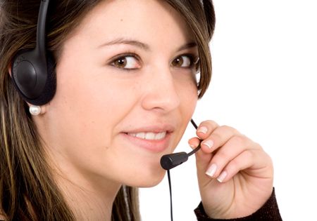 customer service girl smiling with hand on headset - isolated over a white background