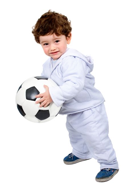 little kid with a football isolated over a white background