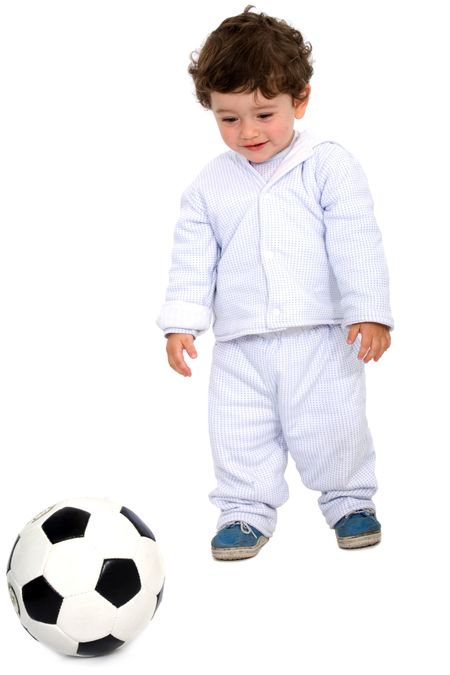 kid with a football isolated over a white background