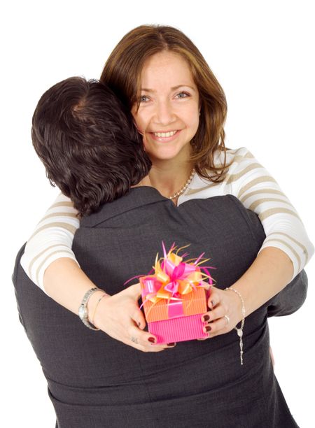 happy girl with a gift from her husband isolated over a white background