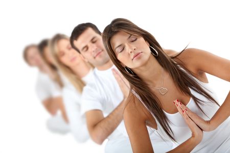 Group of people practicing yoga in white clothes ? isolated