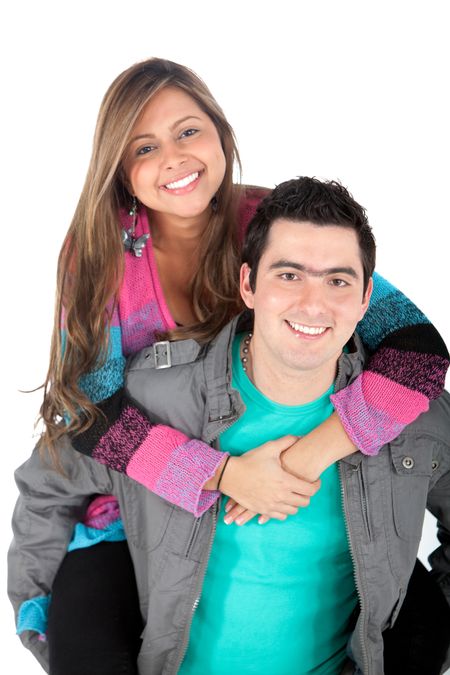 Happy couple hugging and smiling - isolated over a white background