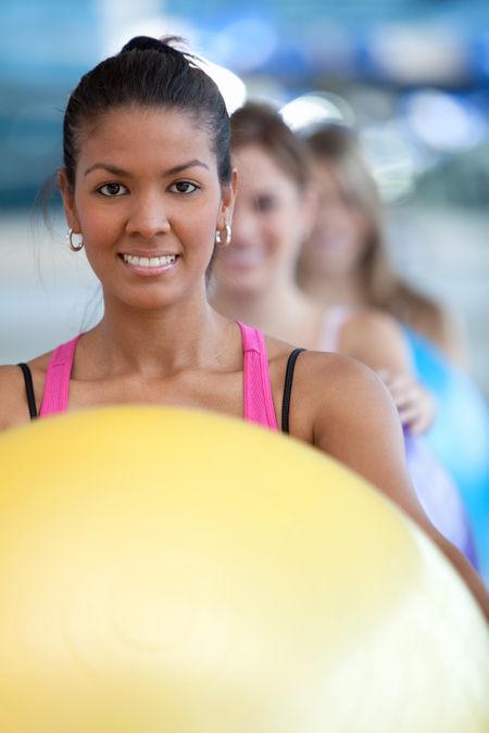 Group of women in a pilates class at the gym