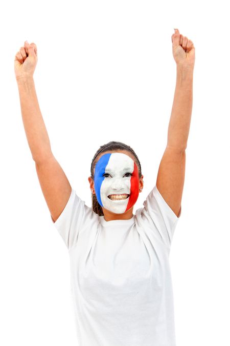 Woman with the French flag painted on her face and arms up - over a white background
