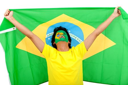 Excited man with the Brazilian flag painted on his face