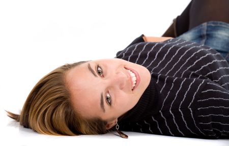 Casual woman portrait on the floor isolated over a white background