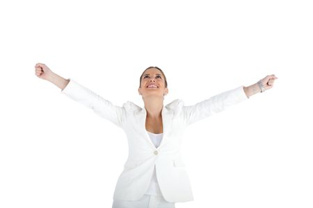 Successful business woman with arms up - isolated over a white background