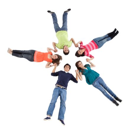Group of friends lying on the floor making a circle - isolated over a white background