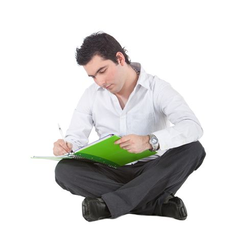 Man studying with a notebook - isolated over a white background