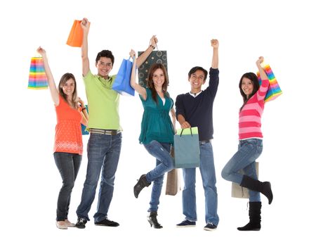 Happy group of shopping people holding bags - isolated over white