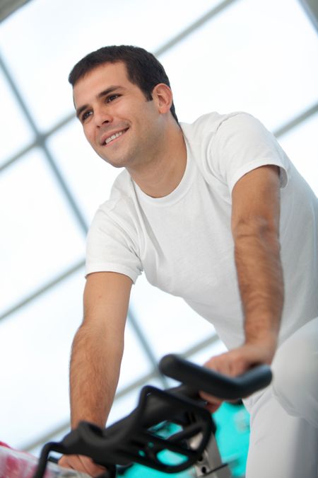 handsome man at the gym and smiling