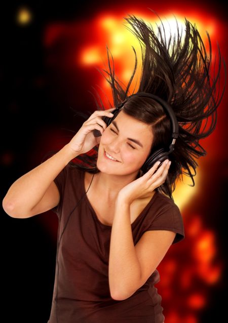 girl listening to music looking happy in a disco