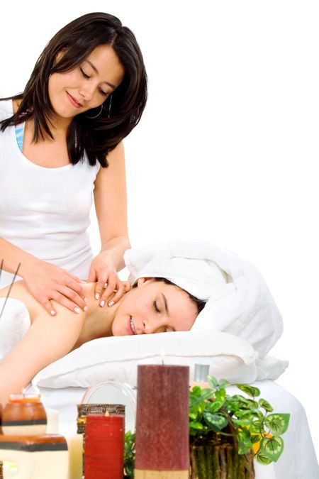 beauty and spa girl giving a massage - isolated over a white background