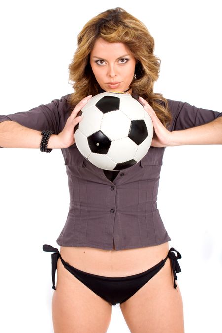 beautiful girl holding a football isolated over a white background