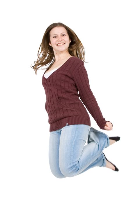girl jumping in the air isolated over a white background