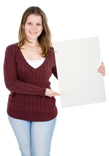 casual girl holding a cardboard isolated over a white background