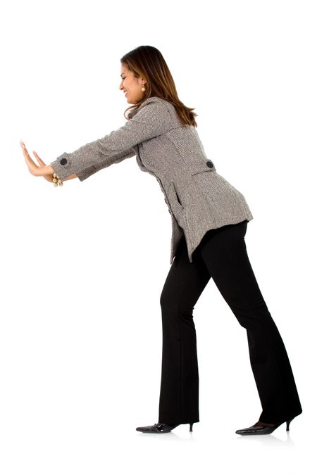 business woman pushing something aside isolated over a white background