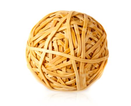 Ball of rubber bands isolated over a white background