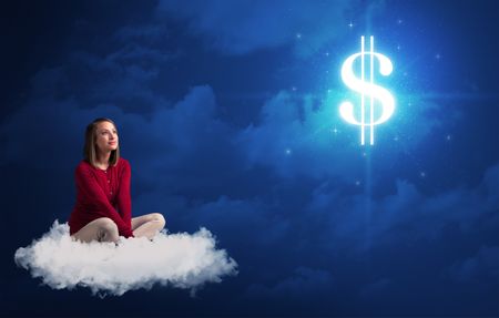Caucasian woman sitting ona white fluffy cloud daydreaming of money
