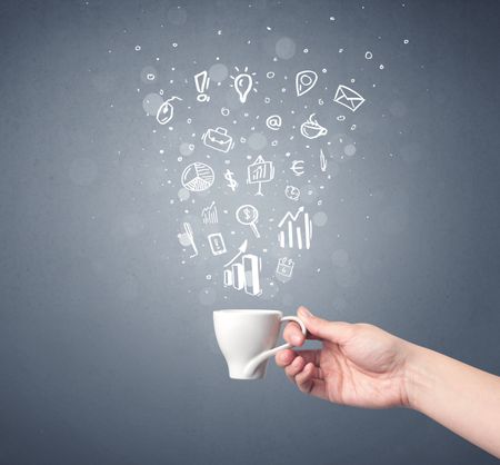 Young female hand holding coffee cup with business related drawings above it 