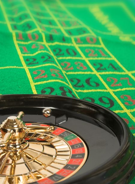 moving roulette with roulette betting sheet at the back