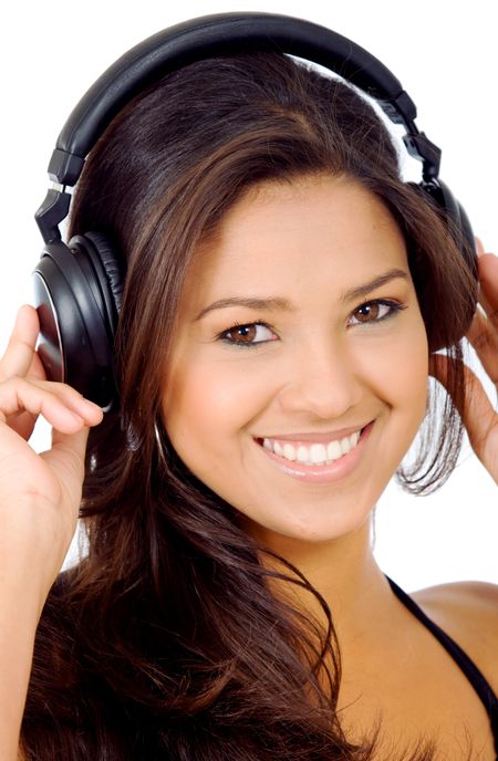 girl listening to music looking happy over a white background