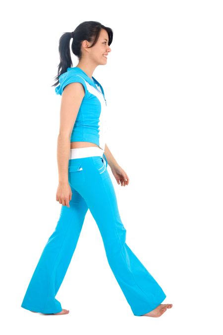 gym girl walking from one side to another - isolated over a white background