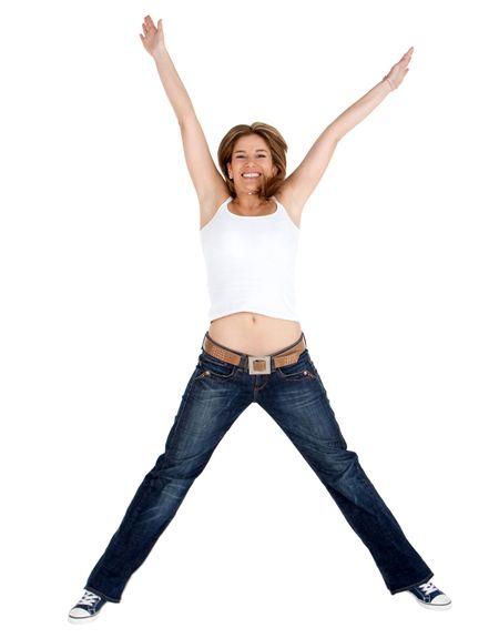 Happy woman jumping - isolated over a white background