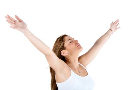 Relaxed woman with arms open and eyes closed - isolated over white