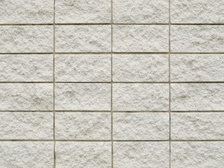 Symmetry of exterior textured stone wall