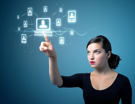 Businesswoman pressing modern social buttons on a virtual background