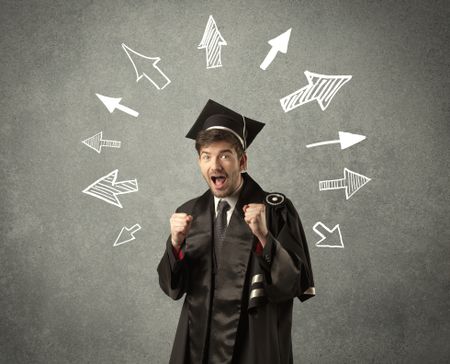 Young graduate student with hand drawn arrows on wall 