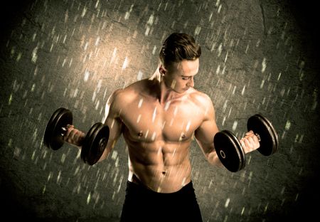 handsome-young-body-builder-weightlifting-showing-593326055 A handsome young body builder weightlifting while showing his muscular upper body in the rain concept