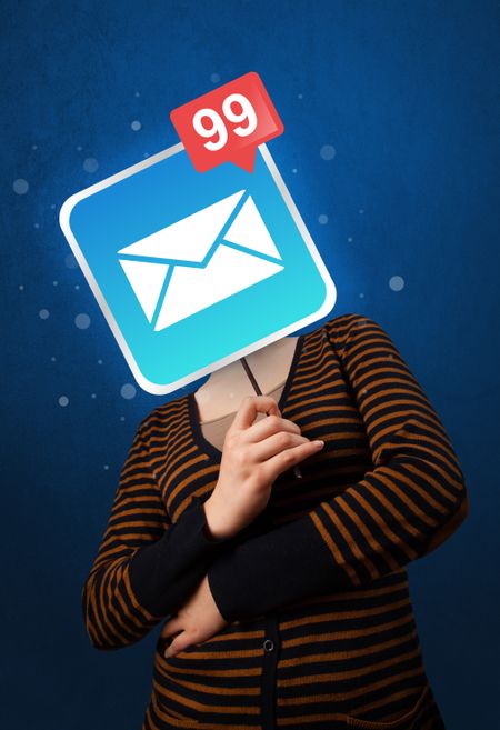 Casual young woman holding square sign with mail icon 