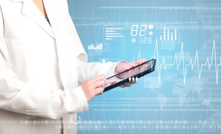 Female doctor holding tablet with blue background and heart related charts 