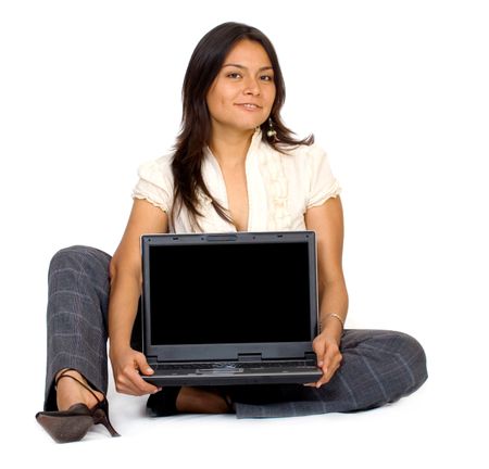 business woman displaying a laptop isolated over a white background