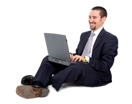 business man working on a laptop computer isolated over a white background