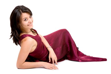 fashion girl in a red dress on the floor isolated over a white background