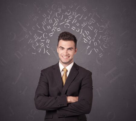 Young businessman with white alphabet around his head