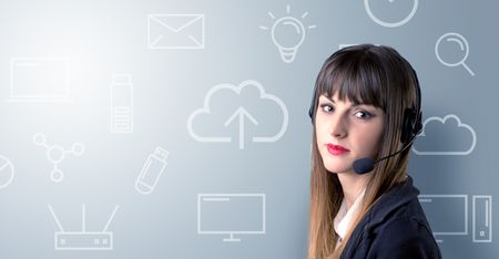 Young female telemarketer with white mixed media icons around her