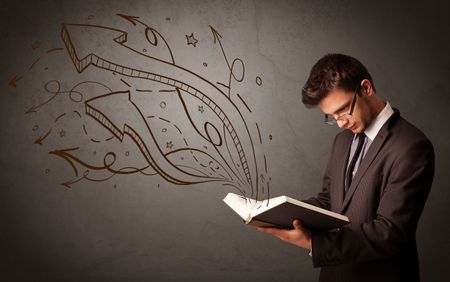 Casual young man holding book with brown arrows and stars flying out of it