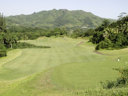 View of rolling fairway from teeing grounds on golf course in Hawaii
