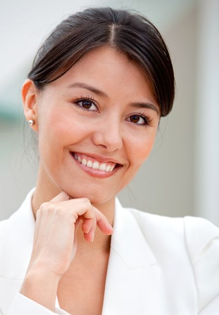 beautiful-business-woman-smiling-office-60030401 Beautiful business woman smiling at the office