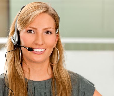 Female customer support operator at the office